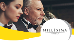 kobieta i mężczyzna degustujący wino z logo Millésima